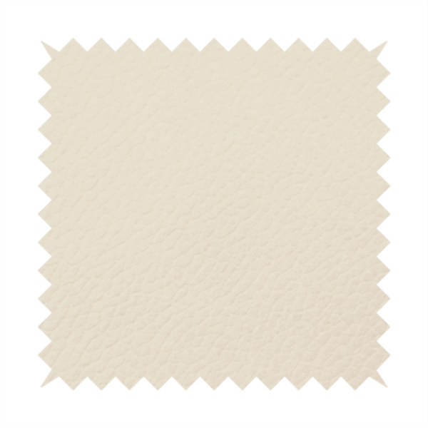 Boston Faux Leather Upholstery Fabric in a soft beige colour, showcasing a fine pebbled texture.