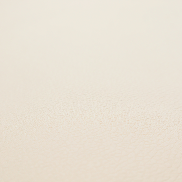 Boston Faux Leather Upholstery Fabric in a soft beige colour, showcasing a fine pebbled texture.