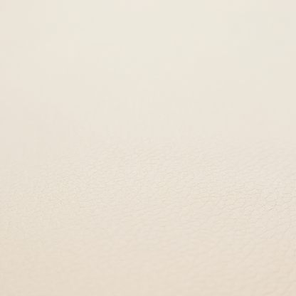 Boston Faux Leather Upholstery Fabric in a soft beige colour, showcasing a fine pebbled texture.