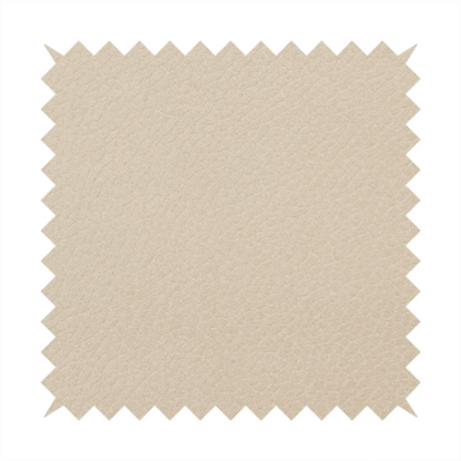Boston Faux Leather Upholstery Fabric in a warm beige tone, showcasing a fine, textured leather grain.