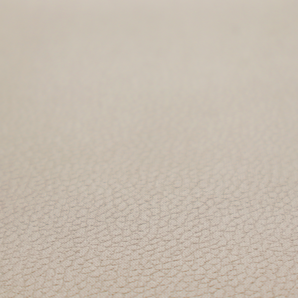 Boston Faux Leather Upholstery Fabric in a taupe-beige colour, showing a prominent pebbled grain texture.