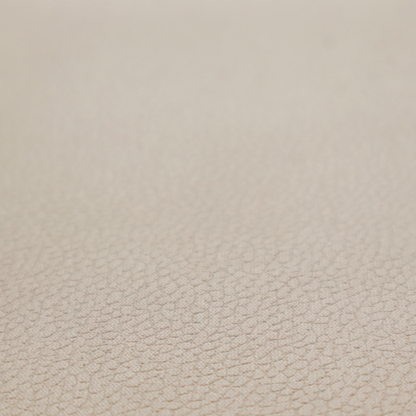 Boston Faux Leather Upholstery Fabric in a taupe-beige colour, showing a prominent pebbled grain texture.