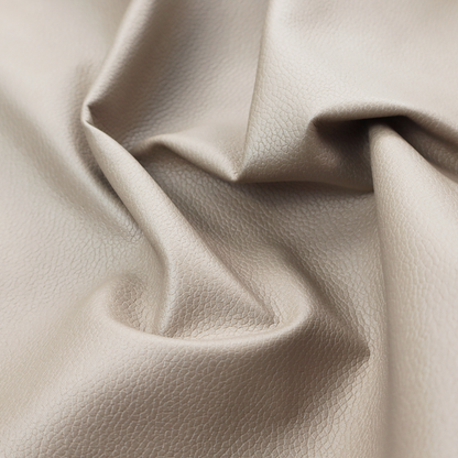 Boston Faux Leather Upholstery Fabric in a taupe-beige colour, showing a prominent pebbled grain texture.