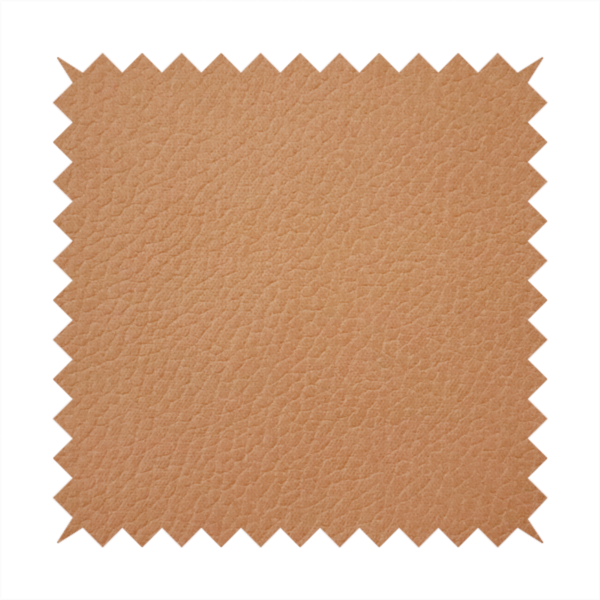 Boston Faux Leather Upholstery Fabric in a warm tan colour, showcasing a fine pebbled grain texture.