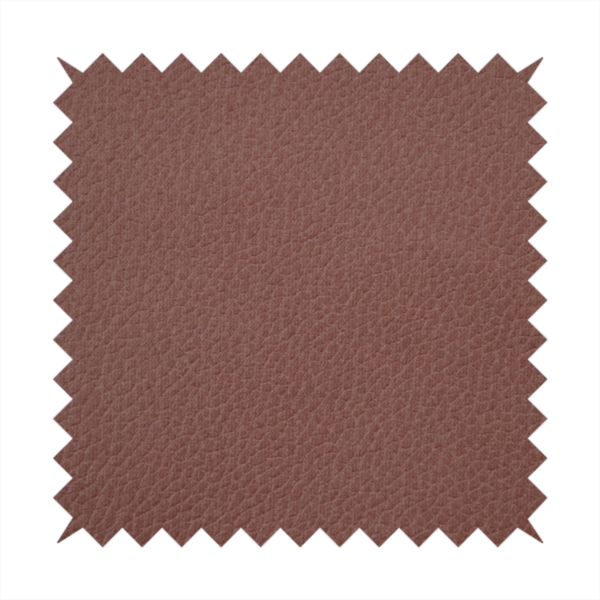 Boston Faux Leather Upholstery Fabric in a deep reddish-brown colour, showcasing a fine pebbled grain texture.