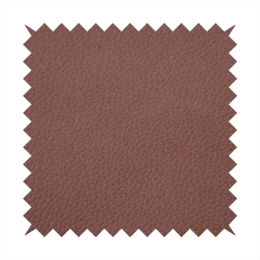 Boston Faux Leather Upholstery Fabric in a deep reddish-brown colour, showcasing a fine pebbled grain texture.