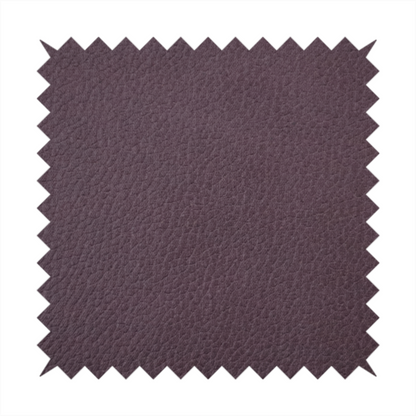 Boston Faux Leather Upholstery Fabric in a deep aubergine purple colour, showcasing a fine pebbled grain texture.
