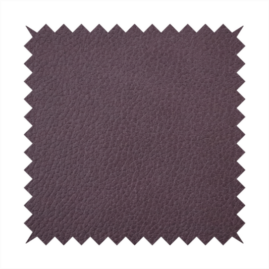 Boston Faux Leather Upholstery Fabric in a deep aubergine purple colour, showcasing a fine pebbled grain texture.