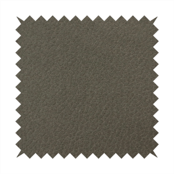 Boston Faux Leather Upholstery Fabric in a deep olive green colour, showcasing a fine pebbled grain texture.