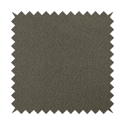 Boston Faux Leather Upholstery Fabric in a deep olive green colour, showcasing a fine pebbled grain texture.