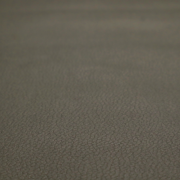 Boston Faux Leather Upholstery Fabric in a deep olive green colour, showcasing a fine pebbled grain texture.