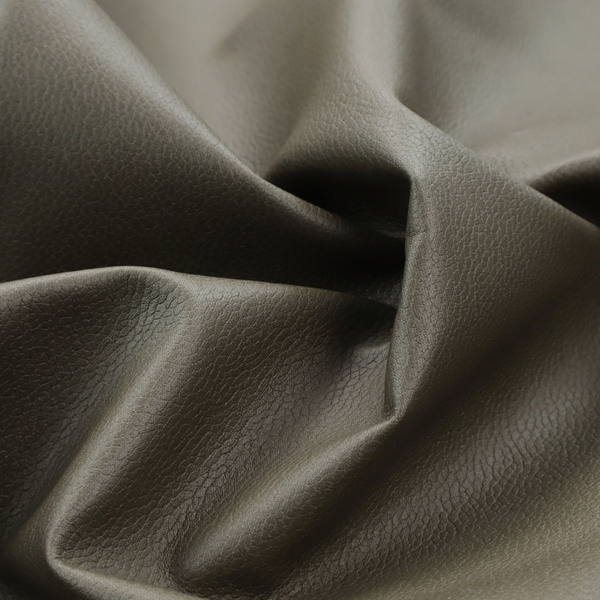 Boston Faux Leather Upholstery Fabric in a deep olive green colour, showcasing a fine pebbled grain texture.