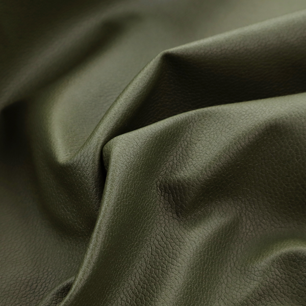 Boston Faux Leather Upholstery Fabric in a rich olive green colour, showcasing a fine pebbled grain texture.