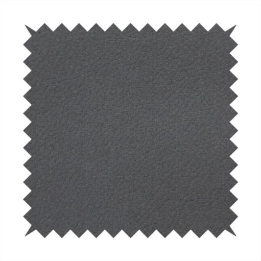 Boston Faux Leather Upholstery Fabric in a mid grey colour, showcasing a fine pebbled grain texture.