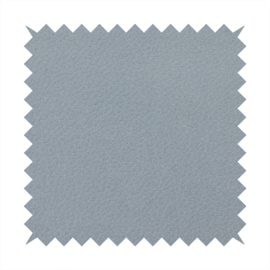 Boston Faux Leather Upholstery Fabric in a light grey colour, showcasing a fine pebbled grain texture.