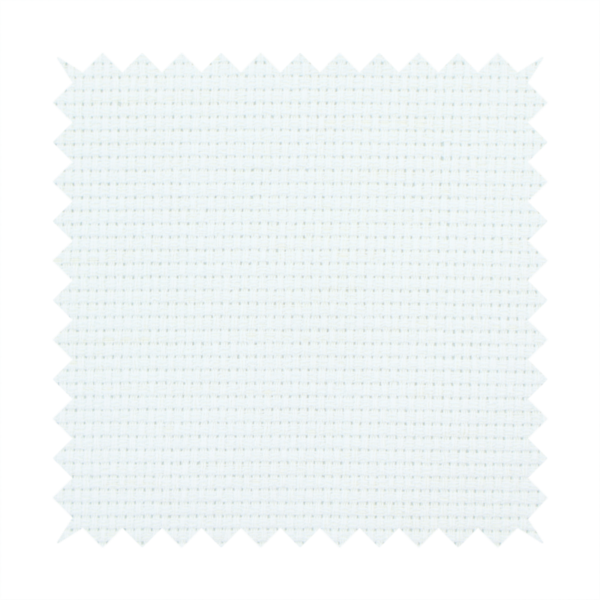 A solid white fabric with a distinct, tightly woven grid texture. The material features a uniform, grid-like pattern of tiny raised squares, reminiscent of Aida cloth or a textured linen blend, creating a subtle, clean, and matte finish across the entire surface.