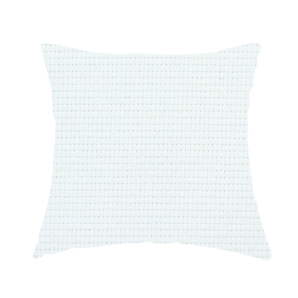 The fabric used to create these handmade cushions is a solid white fabric with a distinct, tightly woven grid texture. The material features a uniform, grid-like pattern of tiny raised squares, reminiscent of Aida cloth or a textured linen blend, creating a subtle, clean, and matte finish across the entire surface.