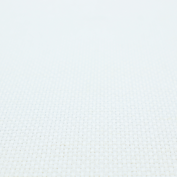 A solid white fabric with a distinct, tightly woven grid texture. The material features a uniform, grid-like pattern of tiny raised squares, reminiscent of Aida cloth or a textured linen blend, creating a subtle, clean, and matte finish across the entire surface.