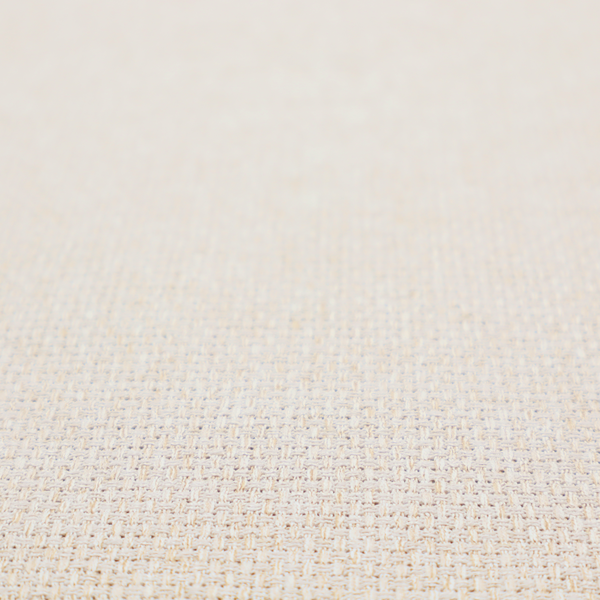 A cream or off-white fabric featuring a distinct, tightly woven grid texture. The material has a uniform, basket-weave style pattern with subtle variations in tone, creating a soft, warm, and matte finish across the entire surface.