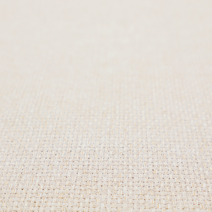 A cream or off-white fabric featuring a distinct, tightly woven grid texture. The material has a uniform, basket-weave style pattern with subtle variations in tone, creating a soft, warm, and matte finish across the entire surface.