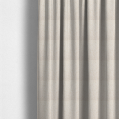 The fabric used to create these made-to-measure curtains is a cream or off-white fabric featuring a distinct, tightly woven grid texture. The material has a uniform, basket-weave style pattern with subtle variations in tone, creating a soft, warm, and matte finish across the entire surface.
