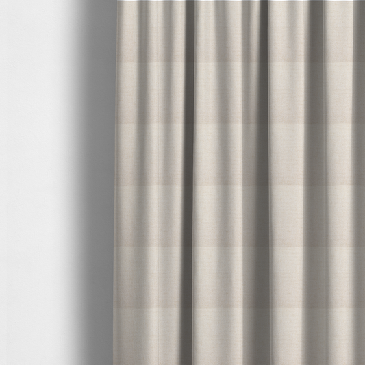 The fabric used to create these made-to-measure curtains is a cream or off-white fabric featuring a distinct, tightly woven grid texture. The material has a uniform, basket-weave style pattern with subtle variations in tone, creating a soft, warm, and matte finish across the entire surface.