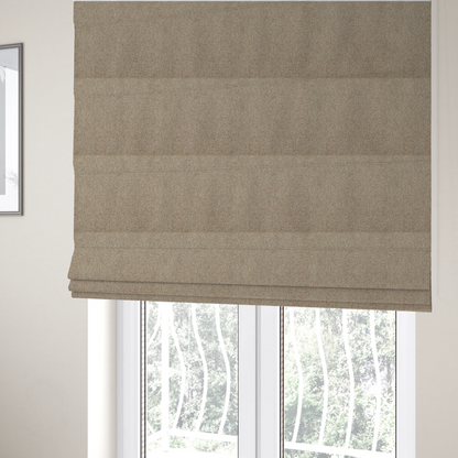 The fabric used to create these Roman blinds is a beige or light taupe fabric featuring a distinct, tightly woven grid texture. The material showcases a multi-tonal, basket-weave style pattern with blending neutral threads, creating a warm, organic, and matte finish across the entire surface.