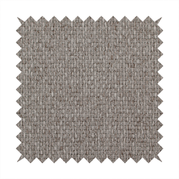 A taupe or light greyish-brown fabric featuring a distinct, tightly woven grid texture. The material showcases a multi-tonal, basket-weave style pattern with blending neutral threads, creating a soft, heathered, and matte finish across the entire surface.