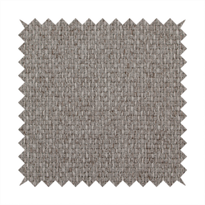 A taupe or light greyish-brown fabric featuring a distinct, tightly woven grid texture. The material showcases a multi-tonal, basket-weave style pattern with blending neutral threads, creating a soft, heathered, and matte finish across the entire surface.