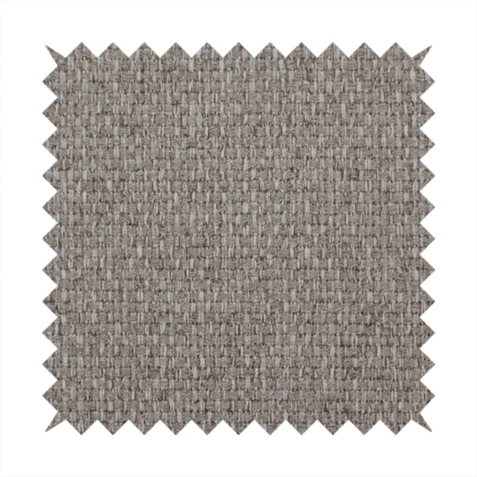 A taupe or light greyish-brown fabric featuring a distinct, tightly woven grid texture. The material showcases a multi-tonal, basket-weave style pattern with blending neutral threads, creating a soft, heathered, and matte finish across the entire surface.