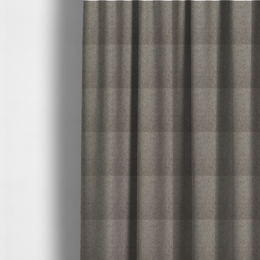 The fabric used to create these made-to-measure curtains is a taupe or light greyish-brown fabric featuring a distinct, tightly woven grid texture. The material showcases a multi-tonal, basket-weave style pattern with blending neutral threads, creating a soft, heathered, and matte finish across the entire surface.