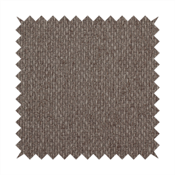 A medium brown or mocha fabric featuring a distinct, tightly woven grid texture. The material showcases a multi-tonal, basket-weave style pattern with interlaced neutral and earthy threads, creating a rich, textured, and matte finish across the entire surface.