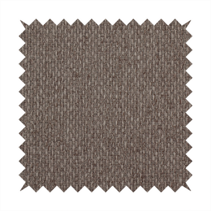 A medium brown or mocha fabric featuring a distinct, tightly woven grid texture. The material showcases a multi-tonal, basket-weave style pattern with interlaced neutral and earthy threads, creating a rich, textured, and matte finish across the entire surface.