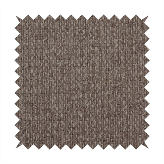 A medium brown or mocha fabric featuring a distinct, tightly woven grid texture. The material showcases a multi-tonal, basket-weave style pattern with interlaced neutral and earthy threads, creating a rich, textured, and matte finish across the entire surface.