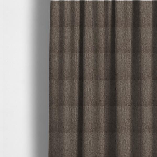 The fabric used to create these made-to-measure curtains is a medium brown or mocha fabric featuring a distinct, tightly woven grid texture. The material showcases a multi-tonal, basket-weave style pattern with interlaced neutral and earthy threads, creating a rich, textured, and matte finish across the entire surface.