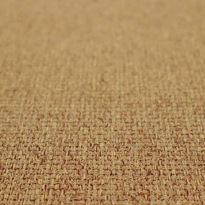 A golden brown or mustard fabric featuring a distinct, tightly woven grid texture. The material showcases a multi-tonal, basket-weave style pattern with blended ochre and tan threads, creating a warm, vibrant, and matte finish across the entire surface.