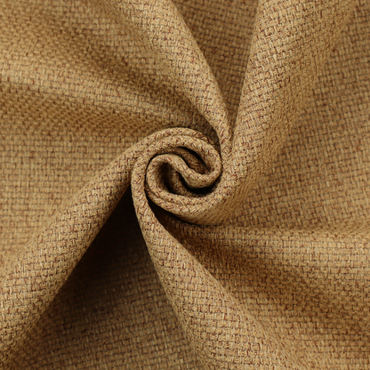 A golden brown or mustard fabric featuring a distinct, tightly woven grid texture. The material showcases a multi-tonal, basket-weave style pattern with blended ochre and tan threads, creating a warm, vibrant, and matte finish across the entire surface.