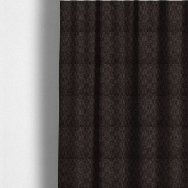 The fabric used to create these made-to-measure curtains is a dark chocolate or espresso brown fabric featuring a distinct, tightly woven grid texture. The material showcases a deep, multi-tonal, basket-weave style pattern with interlaced charcoal and dark brown threads, creating a rich, moody, and matte finish across the entire surface.