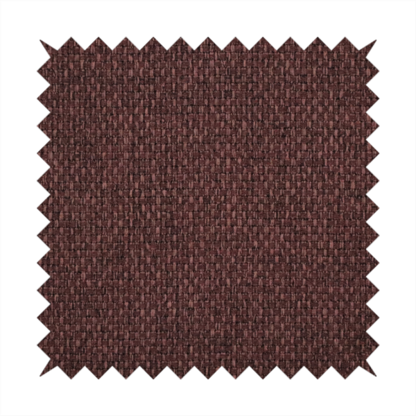 A deep maroon or burgundy fabric featuring a distinct, tightly woven grid texture. The material showcases a rich, multi-tonal, basket-weave style pattern with interlaced plum and dark earthy threads, creating a warm, elegant, and matte finish across the entire surface.