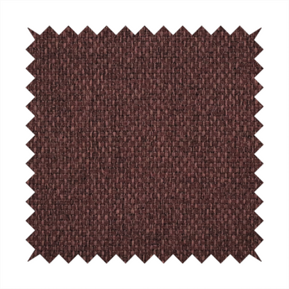 A deep maroon or burgundy fabric featuring a distinct, tightly woven grid texture. The material showcases a rich, multi-tonal, basket-weave style pattern with interlaced plum and dark earthy threads, creating a warm, elegant, and matte finish across the entire surface.