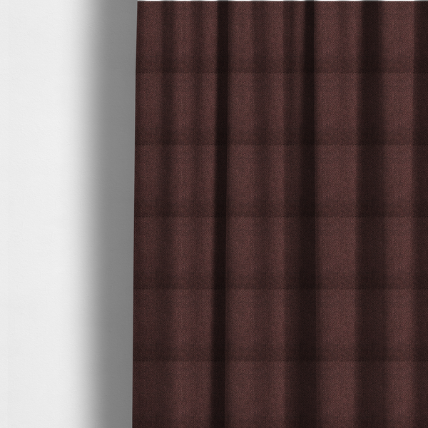 The fabric used to create these made-to-measure curtains is a deep maroon or burgundy fabric featuring a distinct, tightly woven grid texture. The material showcases a rich, multi-tonal, basket-weave style pattern with interlaced plum and dark earthy threads, creating a warm, elegant, and matte finish across the entire surface.