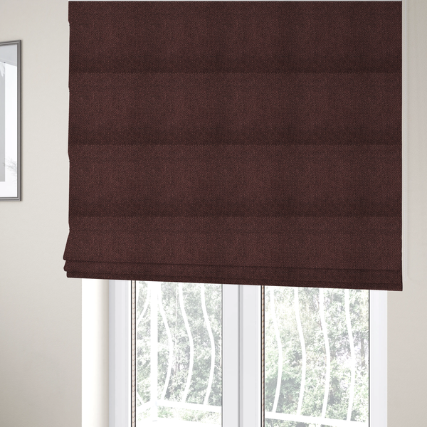 The fabric used to create these Roman blinds is a deep maroon or burgundy fabric featuring a distinct, tightly woven grid texture. The material showcases a rich, multi-tonal, basket-weave style pattern with interlaced plum and dark earthy threads, creating a warm, elegant, and matte finish across the entire surface.