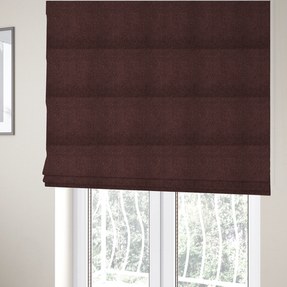 The fabric used to create these Roman blinds is a deep maroon or burgundy fabric featuring a distinct, tightly woven grid texture. The material showcases a rich, multi-tonal, basket-weave style pattern with interlaced plum and dark earthy threads, creating a warm, elegant, and matte finish across the entire surface.