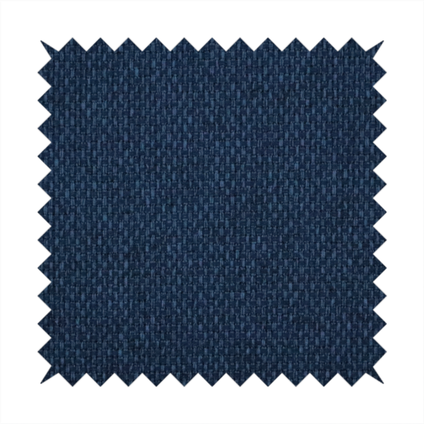 A deep navy or indigo blue fabric featuring a distinct, tightly woven grid texture. The material showcases a multi-tonal, basket-weave style pattern with blended dark blue and subtle charcoal threads, creating a rich, classic, and matte finish across the entire surface.