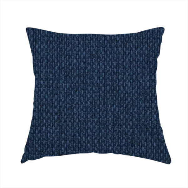 The fabric used to create this handmade cushion is a deep navy or indigo blue fabric featuring a distinct, tightly woven grid texture. The material showcases a multi-tonal, basket-weave style pattern with blended dark blue and subtle charcoal threads, creating a rich, classic, and matte finish across the entire surface.