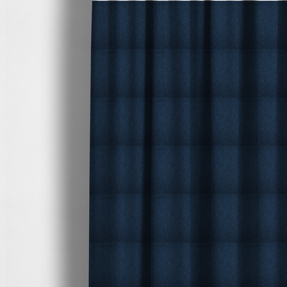 The fabric used to create these made-to-measure curtains is a deep navy or indigo blue fabric featuring a distinct, tightly woven grid texture. The material showcases a multi-tonal, basket-weave style pattern with blended dark blue and subtle charcoal threads, creating a rich, classic, and matte finish across the entire surface.