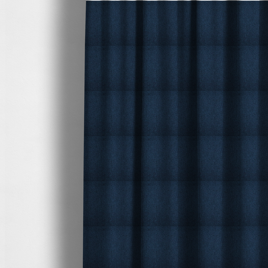 The fabric used to create these made-to-measure curtains is a deep navy or indigo blue fabric featuring a distinct, tightly woven grid texture. The material showcases a multi-tonal, basket-weave style pattern with blended dark blue and subtle charcoal threads, creating a rich, classic, and matte finish across the entire surface.