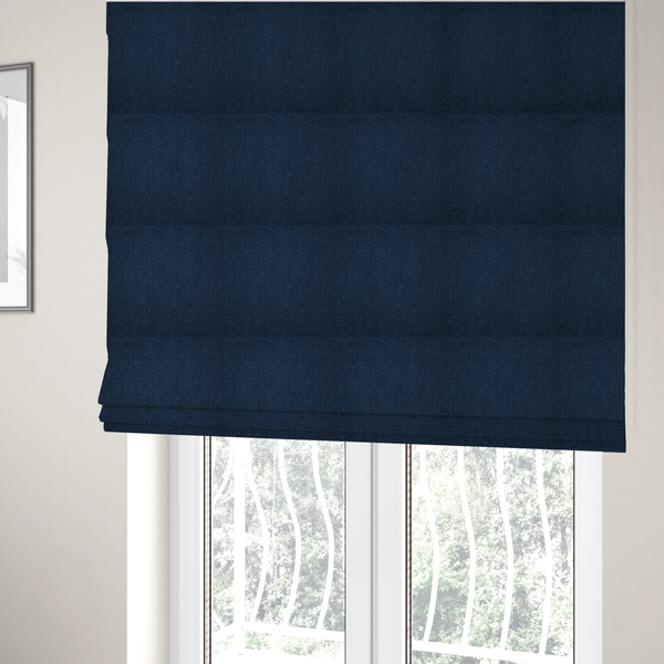 The fabric used to create these Roman blinds is a deep navy or indigo blue fabric featuring a distinct, tightly woven grid texture. The material showcases a multi-tonal, basket-weave style pattern with blended dark blue and subtle charcoal threads, creating a rich, classic, and matte finish across the entire surface.