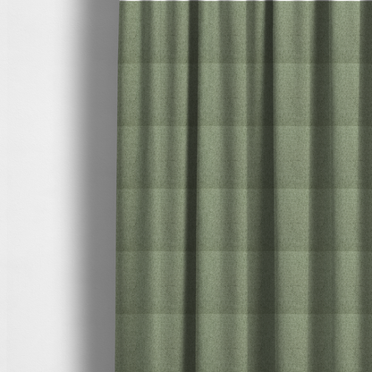 The fabric used to create these made-to-measure curtains is a light sage or mint green fabric featuring a distinct, tightly woven grid texture. The material showcases a multi-tonal, basket-weave style pattern with blended pale green and subtle grey threads, creating a fresh, calming, and matte finish across the entire surface.