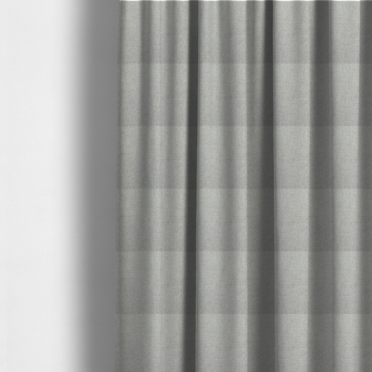 The fabric used to create these made-to-measure curtains is a light silver-grey or ash-grey fabric featuring a distinct, tightly woven grid texture. The material showcases a multi-tonal, basket-weave style pattern with blended cool grey and subtle pale threads, creating a clean, neutral, and matte finish across the entire surface.